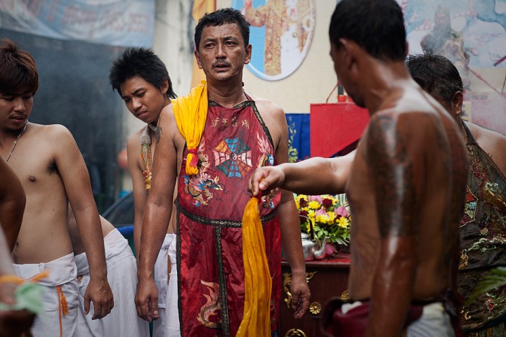 Ma Songs ritual of whipping with boiling oil during the Phuket Vegetarian Festival - Thailand.