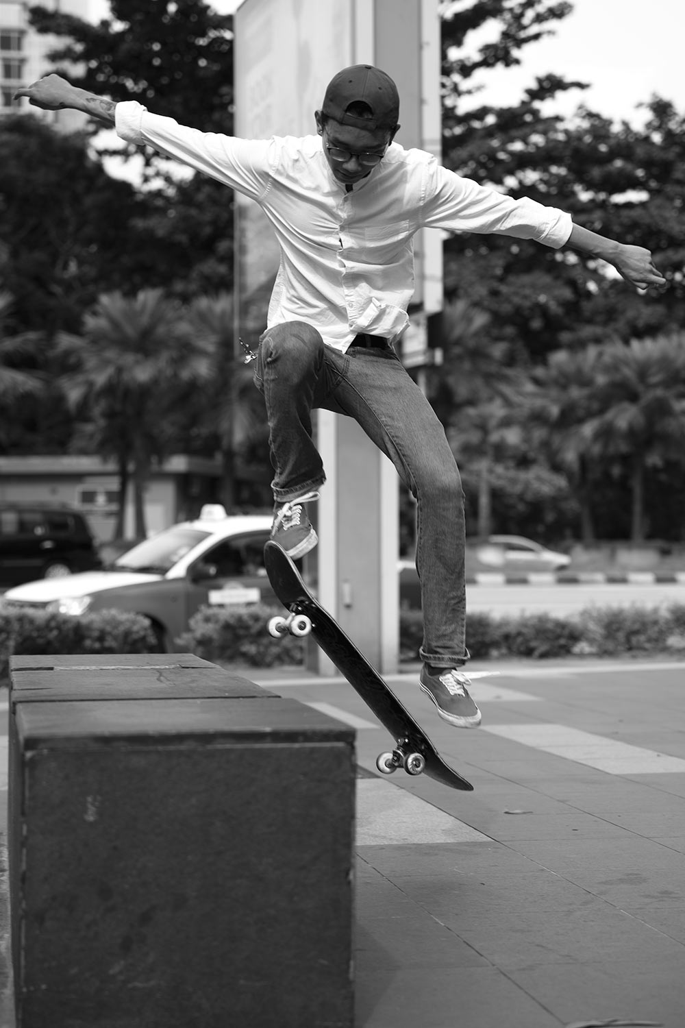 Aiman skateboarding Ampang LRT Station.