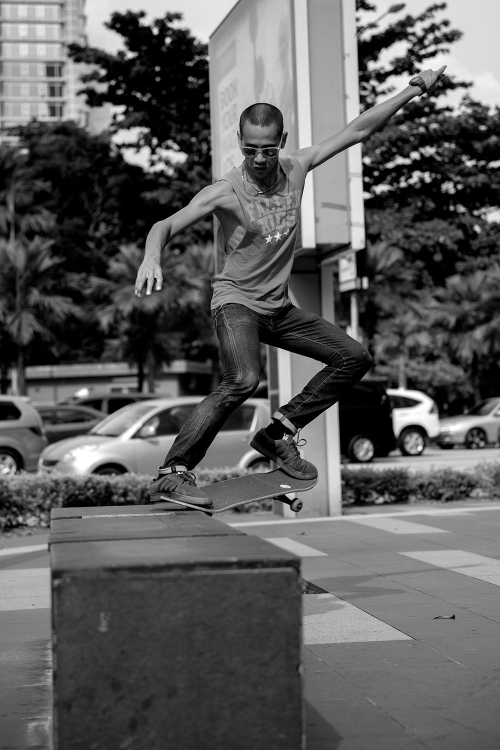 skateboarder jumping rail kuala lumpur malaysia