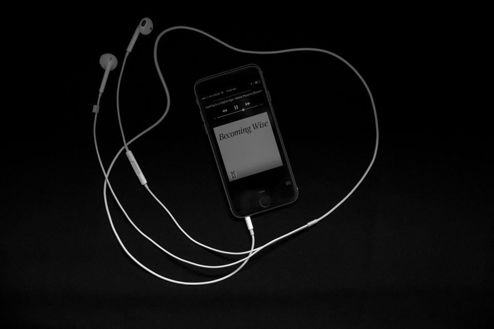 iPhone earbuds listening favourite stations.