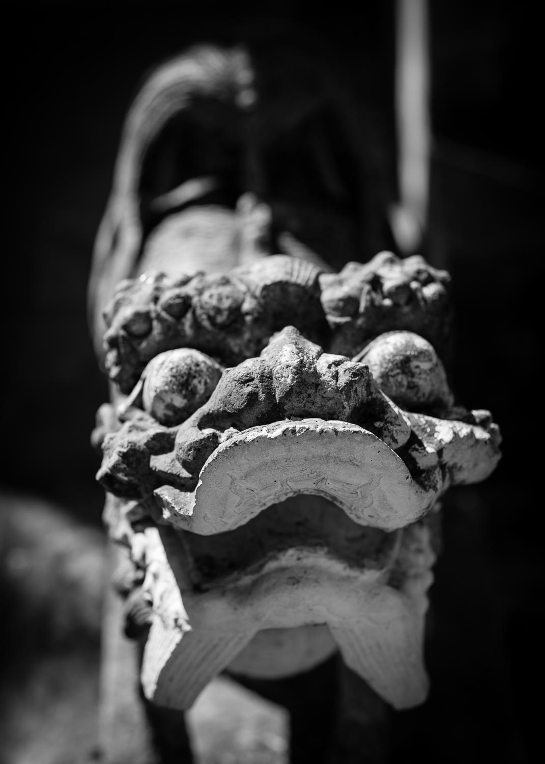 luang prabang temple guardian statue