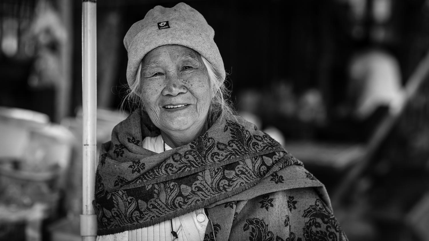 luang prabang smiling woman street portrait
