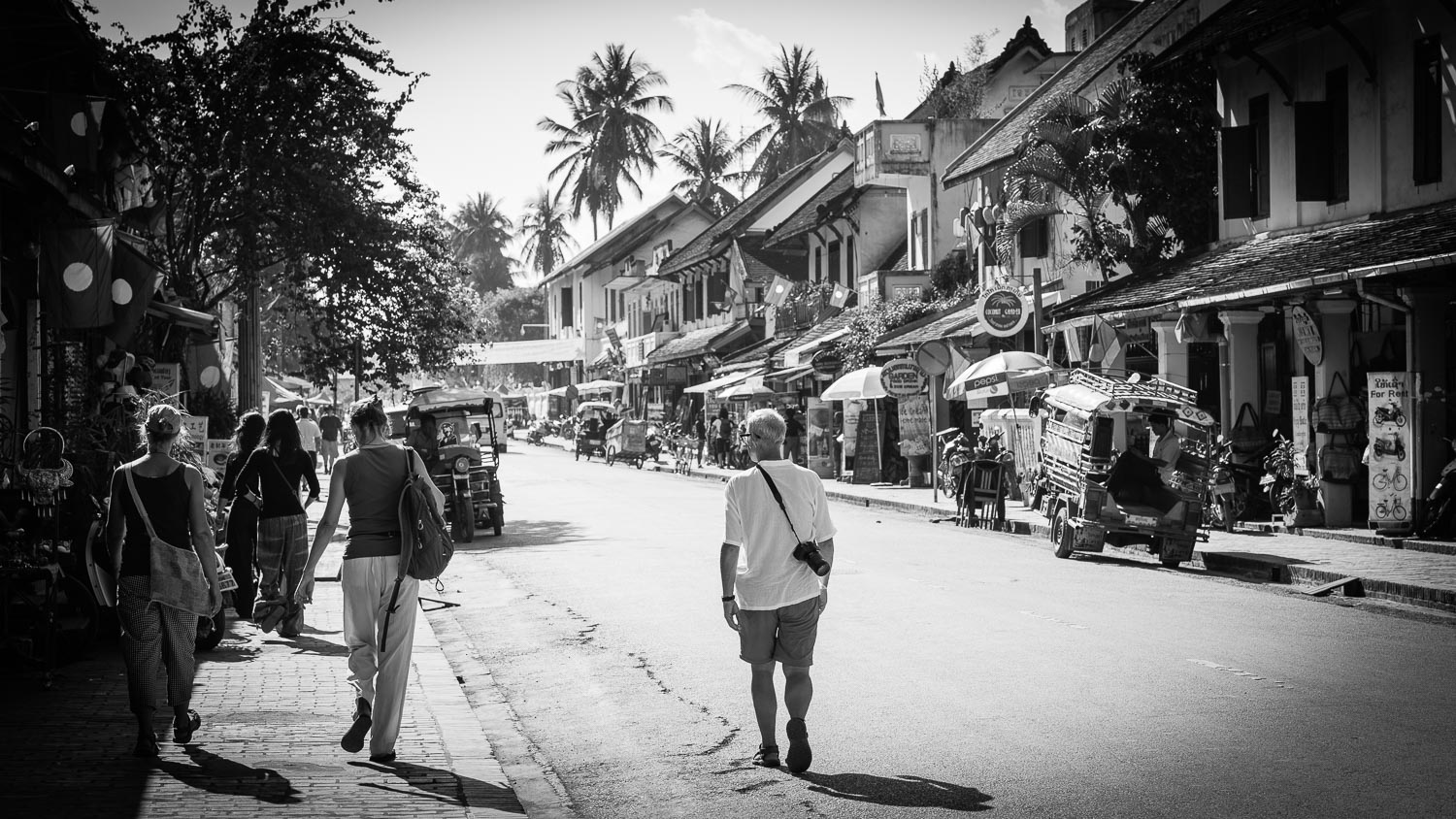 luang prabang tourists walking streets