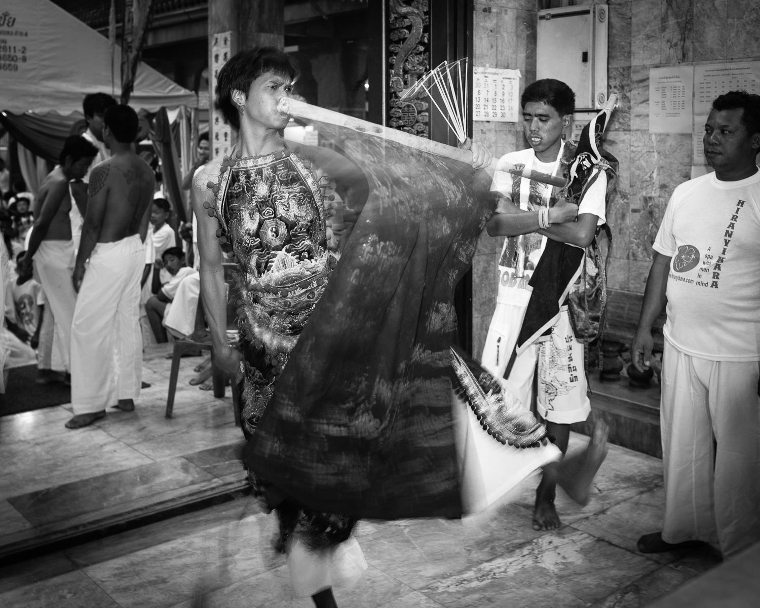 man flag waving dancing trance phuket vegetarian festival