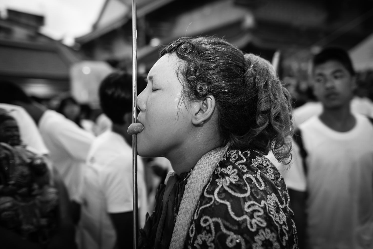 woman tongue piercing ma song phuket vegetarian festival