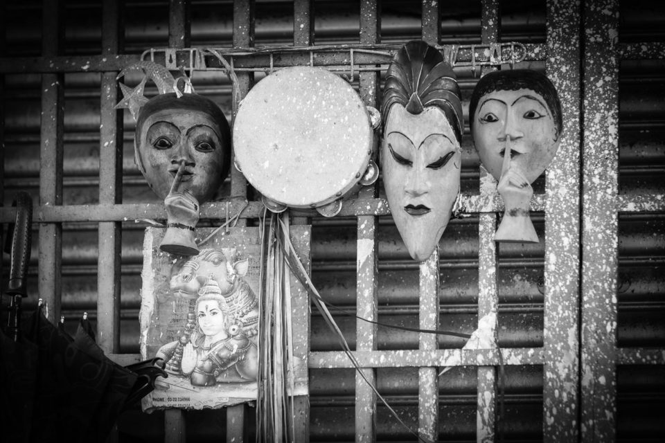 three face masks tambourine street art exhibition